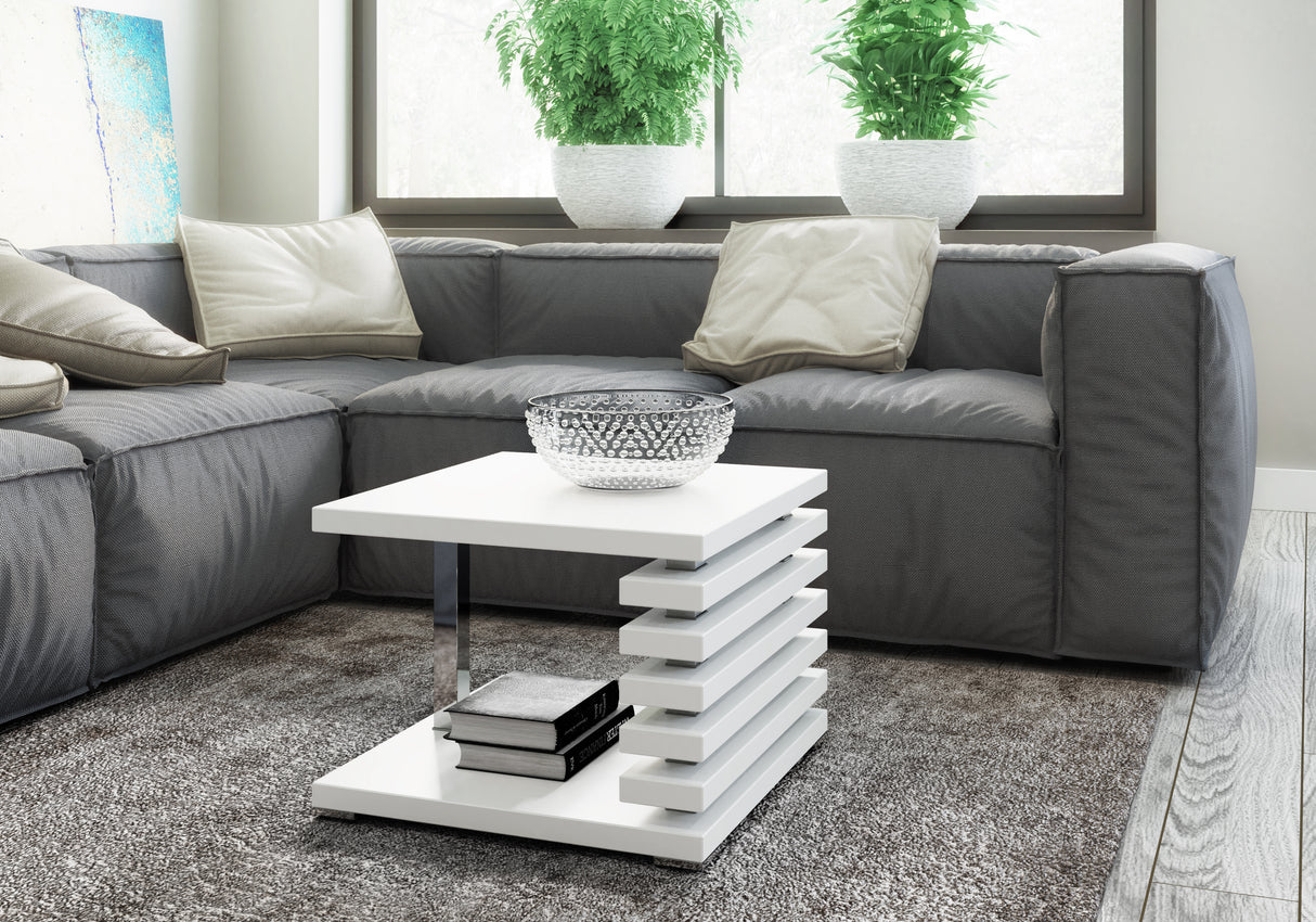 COFFEE TABLE KYOTO WHITEIntroducing COFFEE TABLE KYOTO, an ideal addition to any corner or regular sofa. Its sleek and contemporary rung-shaped structure, adorned with metallic accents, makes it a standout piece. Constructed from a 32mm thick board, this