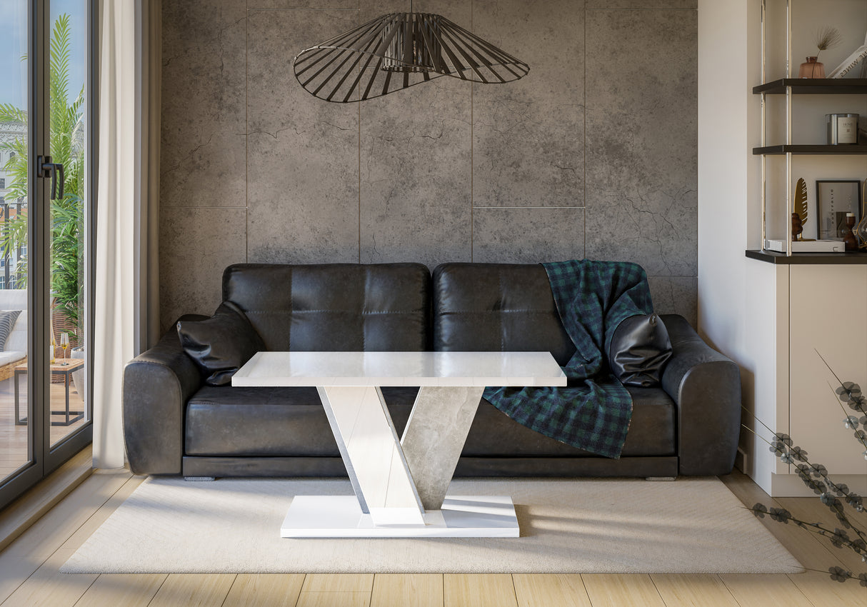 COFFEE TABLE VINEY WHITE GLOSS / STONE GREYCoffee Table Viney White Gloss / Stone Grey The COFFEE TABLE VINEY brings a distinct and contemporary look to any space. Its unconventional design adds a fresh and airy feel to your home decor. Perfect for the di