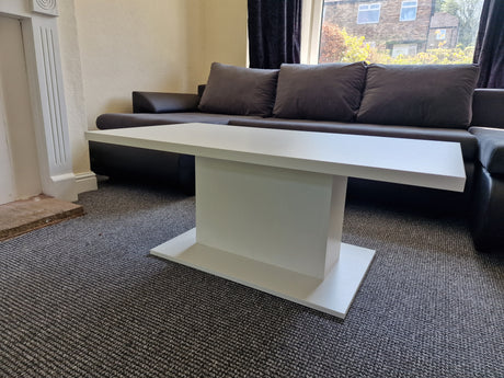 COFFEE TABLE BRISTOL WHITE 110X60CMTable dimensionwid. 110 cm / dep. 60 cm / height 43 cmExecution: base made of white laminated board, 16mm thick The table top is 28mm thick, white.Anna Furniture