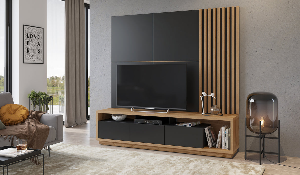 TV WALL UNIT CELINE 09 SLATWALL Wotan/blackThe set consists of the following elements(width/height/depth in cm)CELINE 03 wall panel (146/146/2)Lamellas on the CELINE 04 panel (55/146/7)CELINE 40 TV chest of drawers (200/50/45)Specific information Colorati