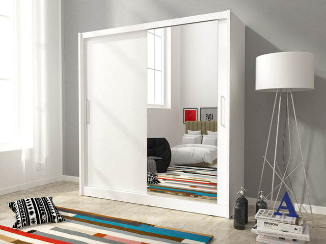 SLIDING DOOR WARDROBE MAJA I 180CM WHITESliding wardrobes with mirror - a clever way to optically enlarge the room Maximize your space with the MAJA I 180CM WHITE sliding door wardrobe. The mirrored panel create the illusion of more room, making it a smar