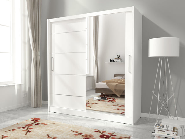 SLIDING DOOR WARDROBE MAJA I ALU 180CM WHITESliding wardrobes with mirror - a clever way to optically enlarge the room Maximize your space with the MAJA I ALU 180CM WHITE sliding door wardrobe. The mirrored panel create the illusion of more room, making i