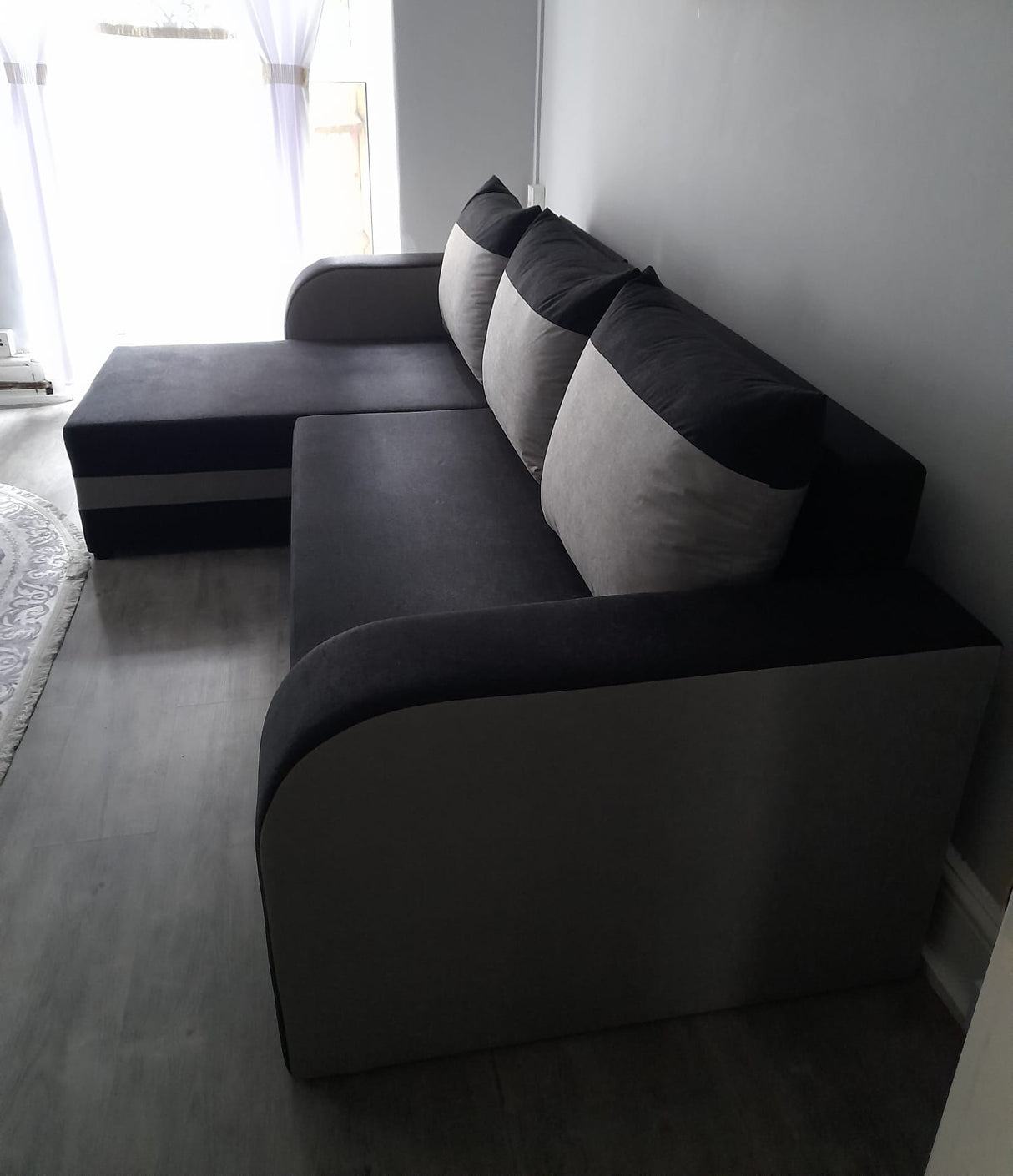 CORNER SOFA BED ALEXA BLACK / DARK GREY 238cm universal RIGHT/LEFT CORNER / FOAMTHIS MODEL IN UNIVERSAL WHICH MEANS YOU CAN CHOOSE CORNER SIDE DURING ASSEMBLY3x PILLOWS INCLUDED1X STORAGE SPACESLEEPING FUNCTIONDIMENTIONSWidth: 238 cmDepth: 140cmSleeping a