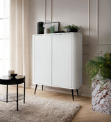 Storage cabinet ZOVA 03 whiteProduct description Dimensions Width 103cm Height 129cm Depth 39cm Details Colour white Material Laminated board 18mm / MDF-board 18mm Veneer ABS edges Legs Metal, in black (23cm) Warranty 24 monthsUncategorizedAnna Furniture