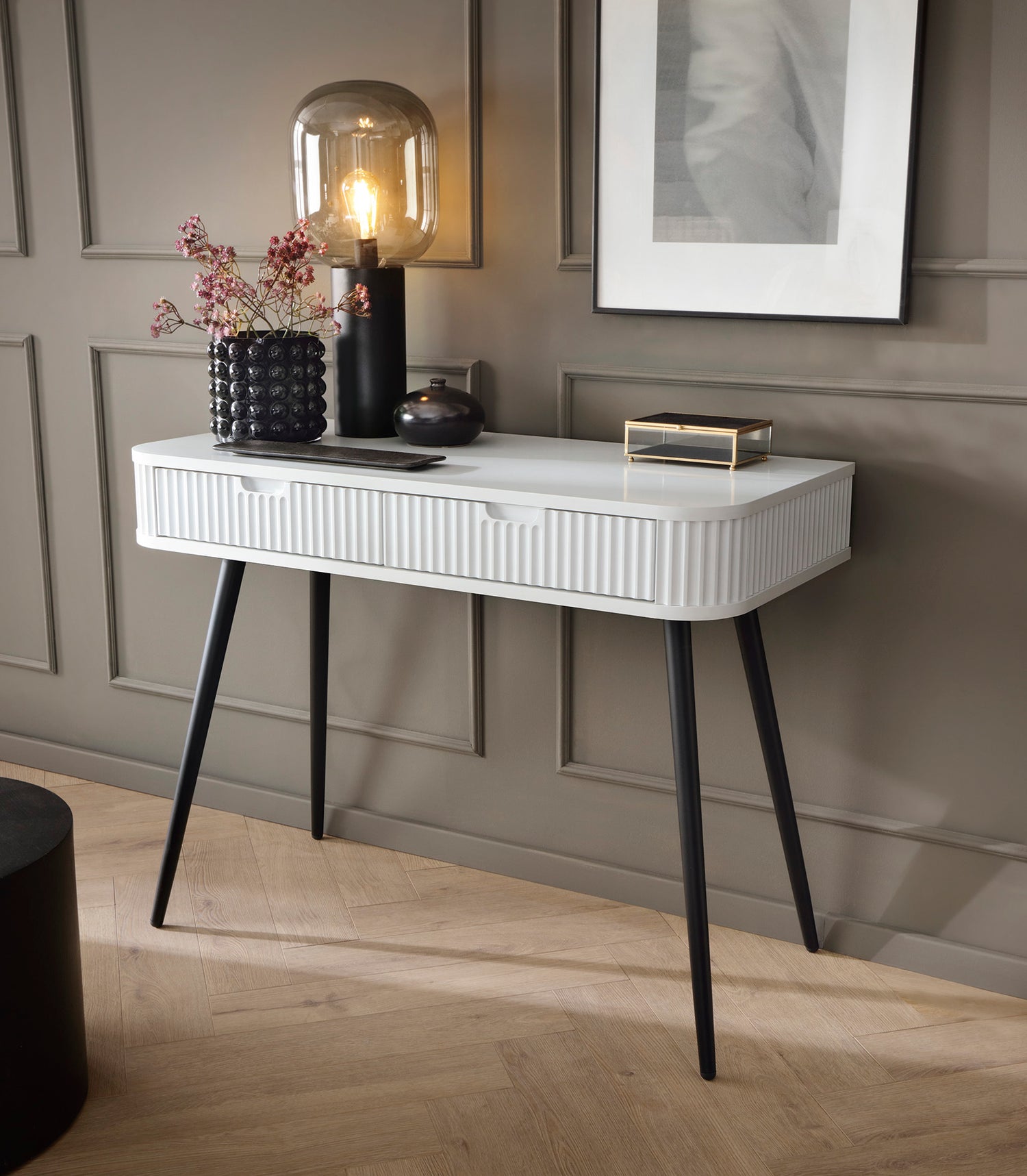 DRESSING TABLE ZOVA WHITEProduct description Dimensions Width 103cm Height 80cm Depth 49cm Details Colour white Material Laminated board 18mm / MDF-board 18mm Veneer ABS edges Legs Metal, in black (65cm) Warranty 24 monthsUncategorizedAnna Furniture