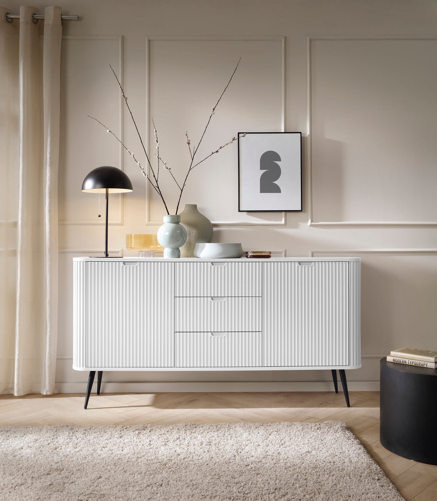 Storage cabinet ZOVA 02 WHITEProduct description Dimensions Width 103cm Height 129cm Depth 39cm Details Colour white Material Laminated board 18mm / MDF-board 18mm Veneer ABS edges Legs Metal, in black (23cm) Warranty 24 monthsUncategorizedAnna Furniture