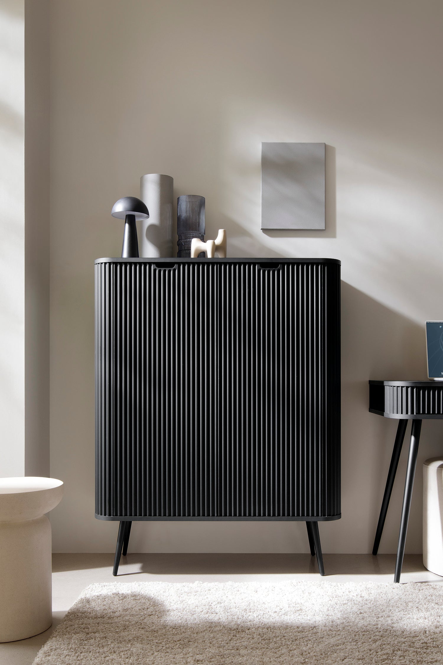 Storage cabinet ZOVA 03 BLACKProduct description Dimensions Width 103cm Height 129cm Depth 39cm Details Colour cashmere Material Laminated board 18mm / MDF-board 18mm Veneer ABS edges Legs Metal, in black (23cm) Warranty 24 monthsUncategorizedAnna Furnitu