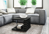 COFFEE TABLE KYOTO BLACK GLOSSIntroducing COFFEE TABLE KYOTO, an ideal addition to any corner or regular sofa. Its sleek and contemporary rung-shaped structure, adorned with metallic accents, makes it a standout piece. Constructed from a 32mm thick board,