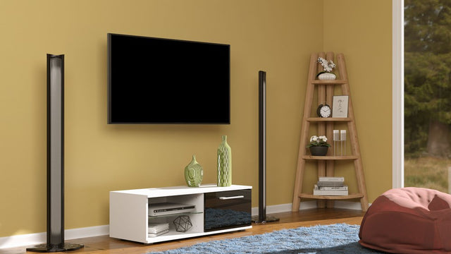 TV STAND SANDY 100CM WHITE/BLACK GLOSSMATERIAL:Fronts - 17 mm thick MDF board, varnished to a high gloss.Body - 16mm thick laminated chipboard.DIMENSIONS:Depth: 40 cmWidth: 100 cmHeight: 36 cmThe highest quality varnish used for the finish is resistant to