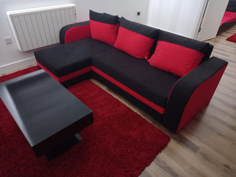 CORNER SOFA BED ALEXA BLACK / RED 238cm universal RIGHT/LEFT CORNER / FOAMTHIS MODEL IN UNIVERSAL WHICH MEANS YOU CAN CHOOSE CORNER SIDE DURING ASSEMBLY3x PILLOWS INCLUDED1X STORAGE SPACESLEEPING FUNCTIONDIMENTIONSWidth: 238 cmDepth: 140cmSleeping area: 2