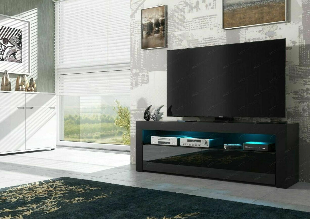 TV STAND DACO 2 BLACK GLOSS FRONTS 160CMDepth: 40 cmWidth: 160 cmHeight: 45 cmMinimalist designThe cabinet has 2 functional and roomy storage compartments.The furniture has high gloss lacquered fronts and the body of the furniture is matt.A modern RTV tab